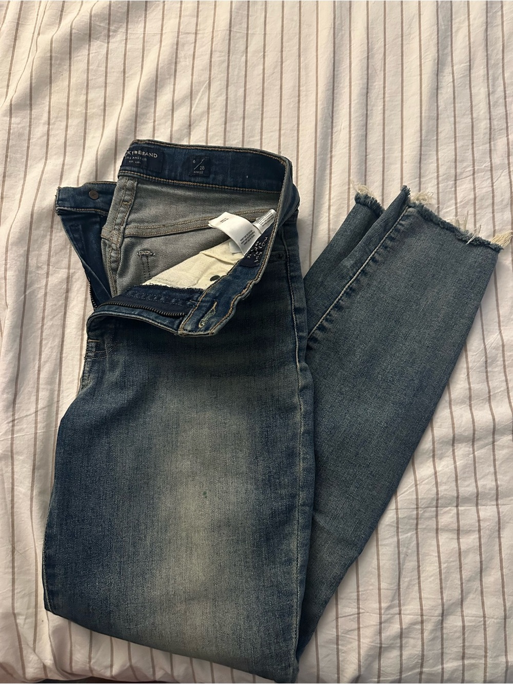 Lucky Brand Women’s Slim Washed Blue Jeans with Raw Hem